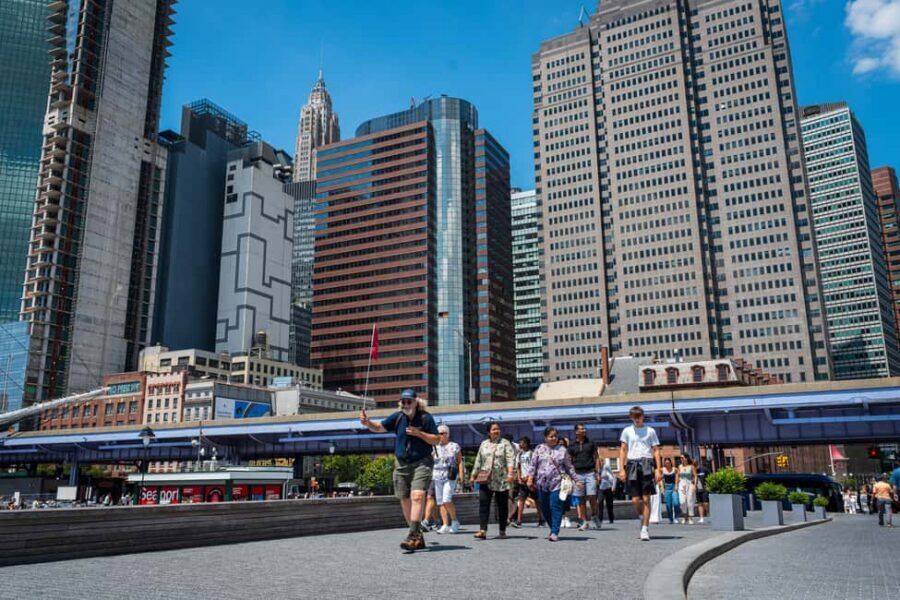 NYC: Half-Day Luxury Bus Tour with One World Access - Flatiron to Washington Square Arch: From Classic Landmarks to Street Energy